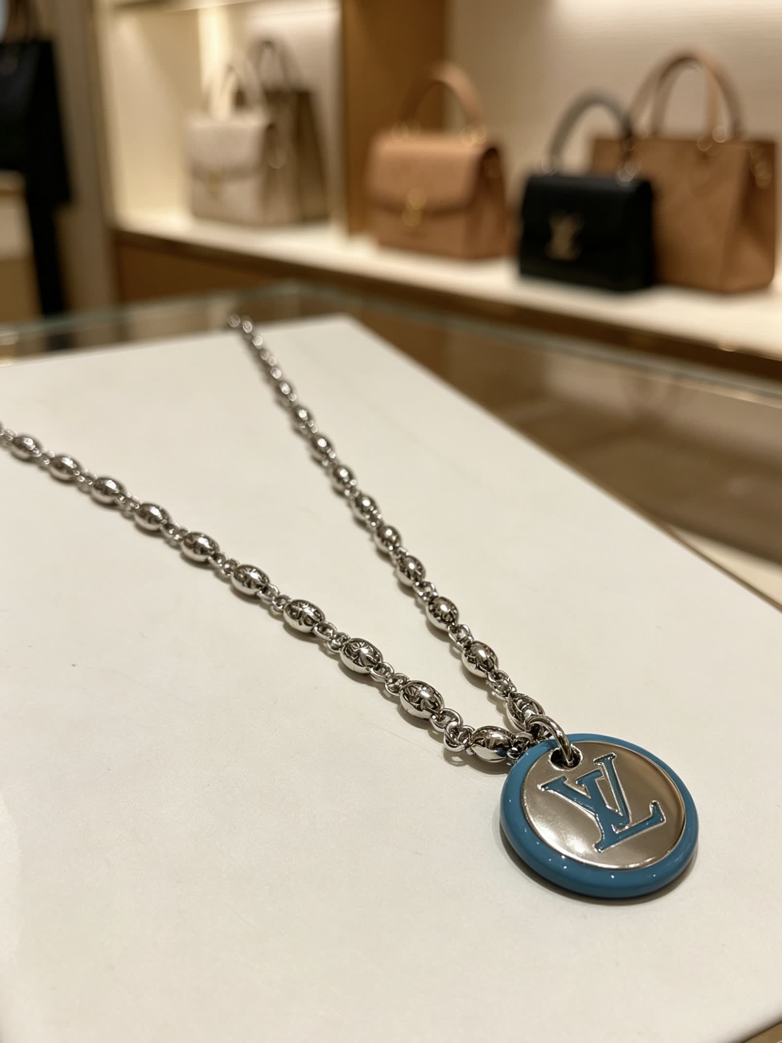 Louis Vuitton Silver and Blue Logo Pendant Necklace